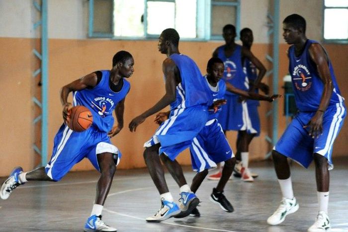 Student athletes at the SEEDS Academy (Sport for Education and Economic Development), a free basketball-focused boarding school in Thies, Senegal, take part in a practice session, on November 28, 2012