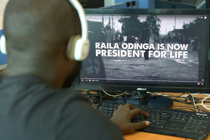 A man watches a hard-hitting online campaign ad just weeks before national elections, in Nairobi on July 13, 2017