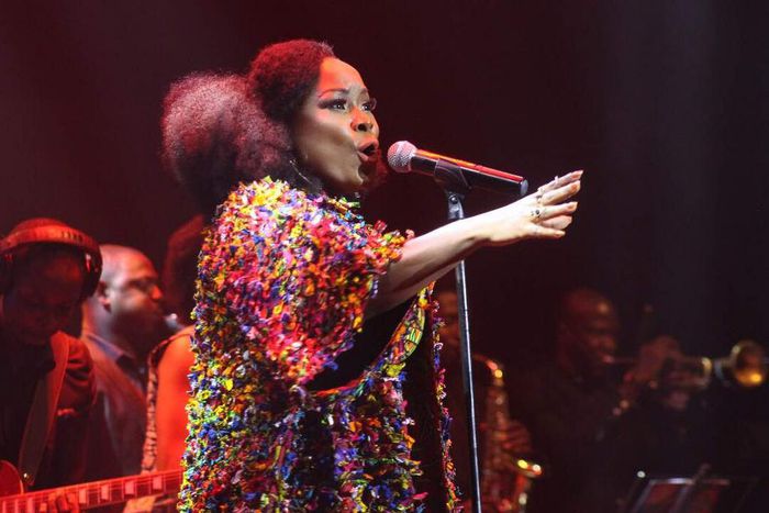 Omawumi in Ituen Basi jacket and Rozarri Couture bodycon dress