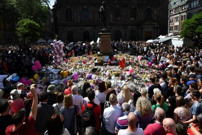 The crowd broke out into spontaneous song after the minute's silence