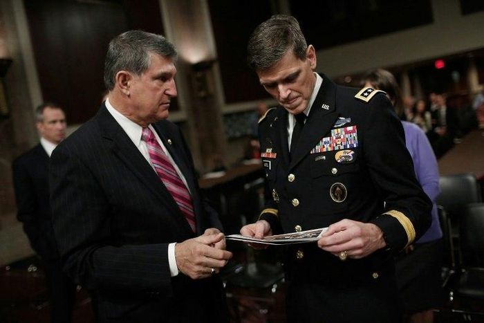 US General Joe Votel (R) said "somewhere between four and 12" civilians were killed in a special forces raid against Al Qaeda in Yemen in January