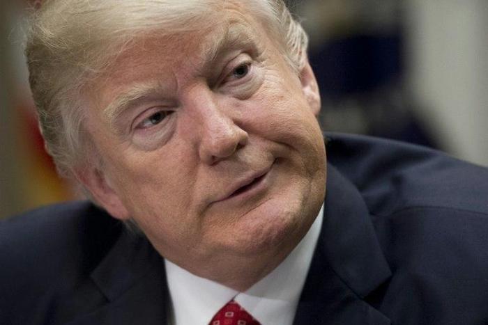 US President Donald Trump speaks during a meeting with county sheriffs in the Roosevelt Room of the White House in Washington, DC, February 7, 2017