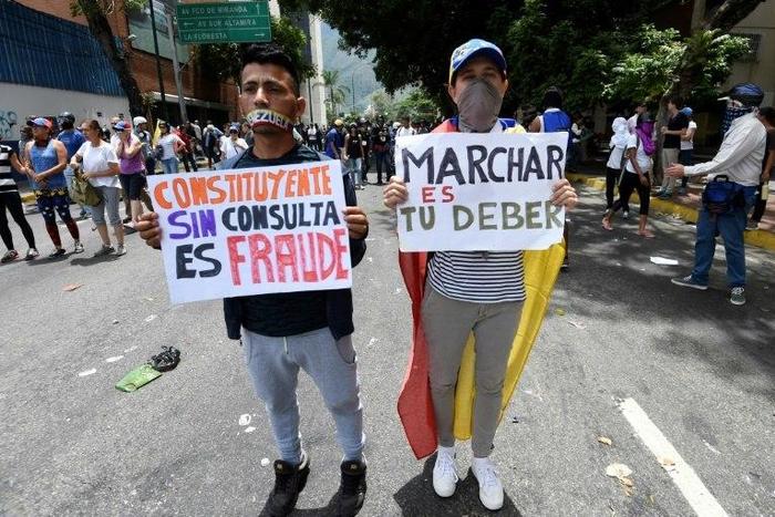 Clashes between police and protestors who are demanding elections to replace President Nicolas Maduro have been going on for two months