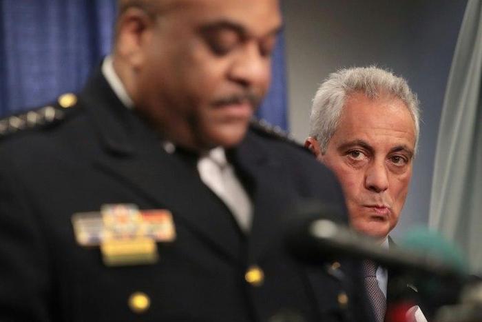 Chicago Mayor Rahm Emanuel listens as Police Superintendent Eddie Johnson speaks at a press conference called by U.S. Attorney General Loretta Lynch on January 13, 2017 in Chicago, Illinois