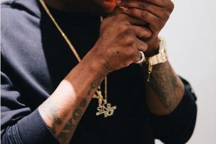 Wizkid lighting his 'smoke'