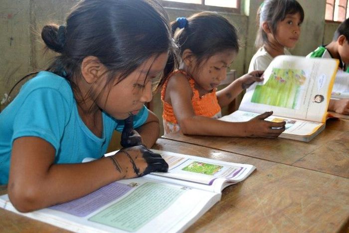 Amazonian children take part in activities designed to practice their native language in an effort to assure the continuity of their cultural heritage in Tingo Maria, Peru