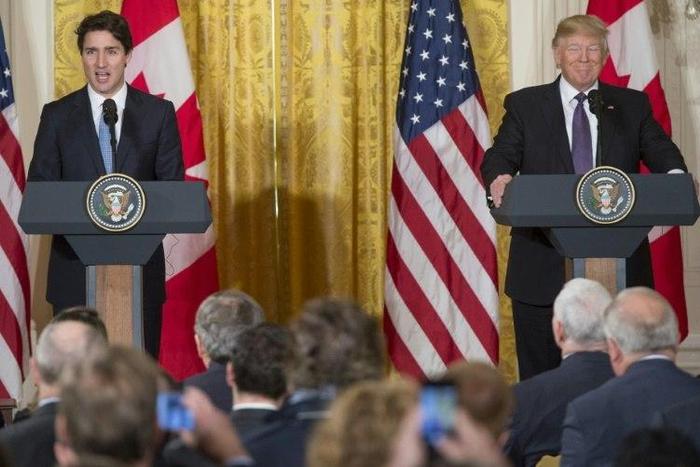 US President Donald Trump and Canadian Prime Minister Justin Trudeau hold a joint press conference in the East Room of the White House in Washington, DC, February 13, 2017
