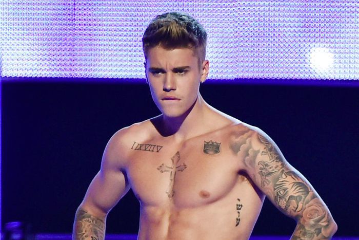 Justin Bieber showing off his bare torso