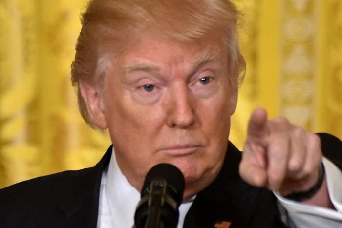US President Donald Trump said there is "zero chaos" in his crisis-hit administration, and railed against enemies in the media, politics and the courts
