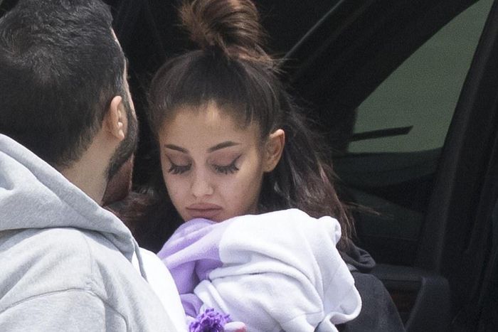 Ariana Grande tearful touchdown