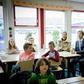 Dutch Queen Maxima and Dutch state secretary of education Sander Dekker sit in on a lesson at an elementary school--Dekker refused to grant an Islamic school funding after a member of the board voiced support for the Islamic State