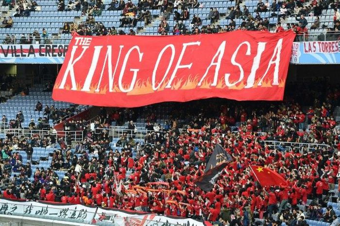 Supporters of Guangzhou Evergrande pictured in 2015 before a third-place Club World Cup match against Sanfreece Hiroshima