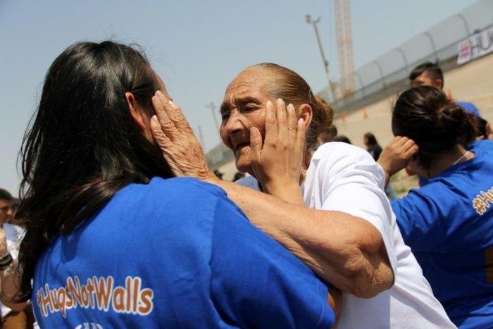 Families separated by the US-Mexico border are reunited for a few minutes in a "Hugs Not Walls" event in Ciudad Juarez, Mexico on June 24, 2017