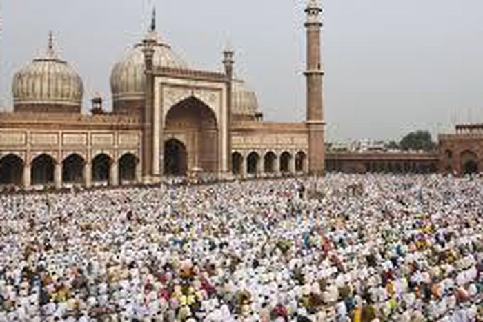 Musllims worshiping in a mosque