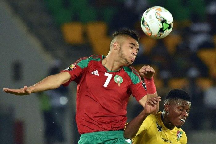 Morocco's forward Youssef En-Nesyri (L) heads the ball during their Africa Cup of Nations match against Togo in Oyem on January 20, 2017