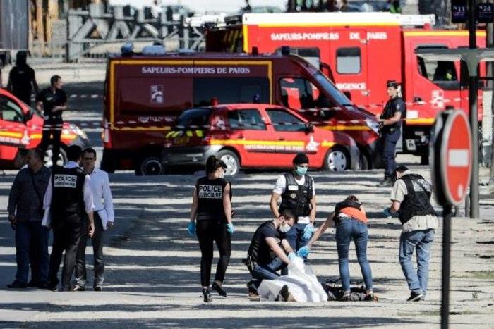 A radical Islamist rammed his car into a police van on Paris's famous Champs-Elysees Avenue on Monday