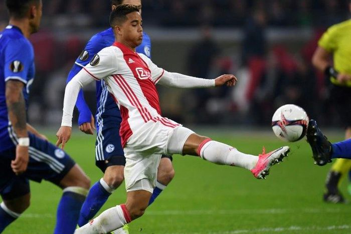 Justin Kluivert, 17, is turning heads in the Ajax red and white and some say he's even more skillful than the father Patrick