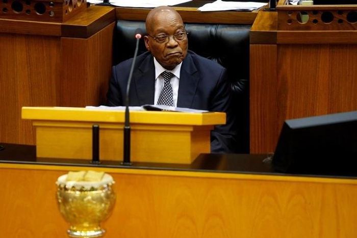 President Jacob Zuma looks on as members of Julius Malema's Economic Freedom Fighters (EFF) party raise objections during Zuma's question and answer session in Parliament in Cape Town, South Africa, September 13, 2016.