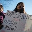 People protest outside the White House on February 4, 2017
