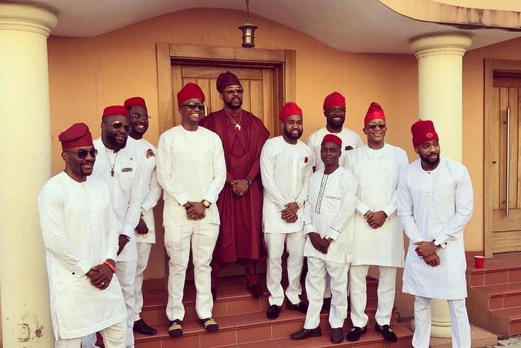 Banky W, flanked by his close friends.