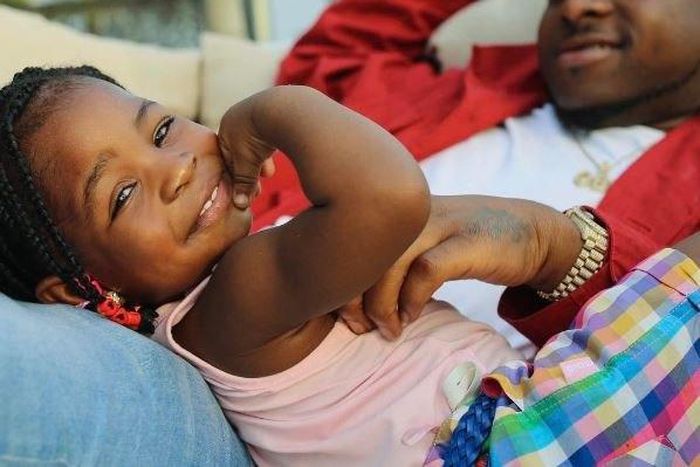 Davido and a smiling Imade