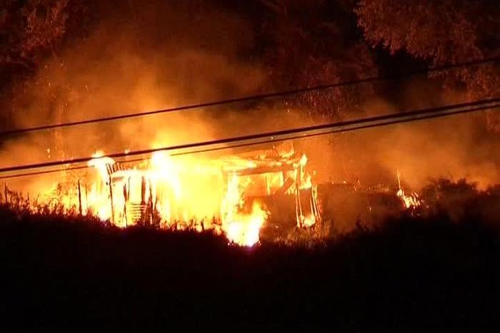 ___7043460___https:______static.pulse.com.gh___webservice___escenic___binary___7043460___2017___7___25___0___983906632-peri-forest-fire-fire-disaster-wooden-hut