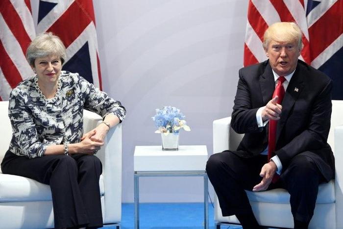British Prime Minister Theresa May has come under fire for seeking to curry favour with Donald Trump by inviting him for a state visit just seven days after he took office.