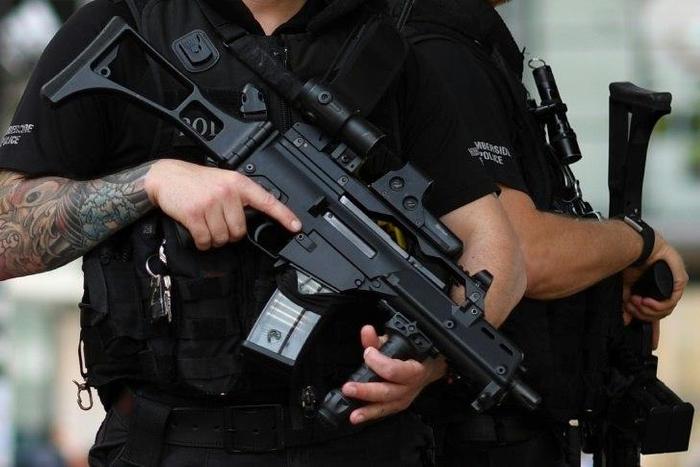 Armed police secure a street in central Manchester, on May 24, 2017