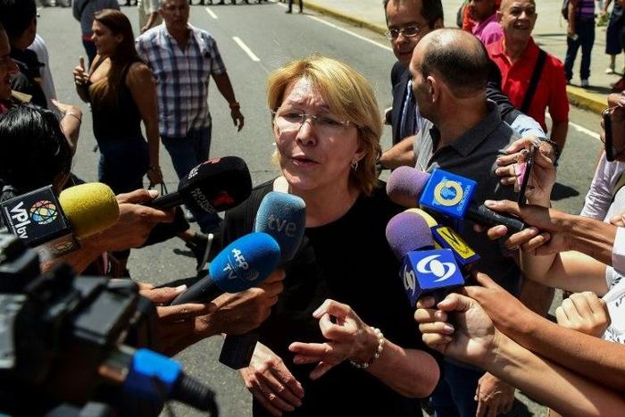 Venezuela's attorney general Luisa Ortega, one of President Nicolas Maduro's most vocal critics, speaks to the press during a flash visit to the Public Prosecutor's office in Caracas, on August 5, 2017