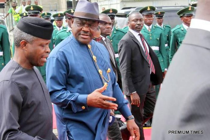 Yemi Osinbajo and Rivers State Governor, Nyesom Wike during an airport reception for the Acting President in Port Harcourt on Thursday, July 27, 2017