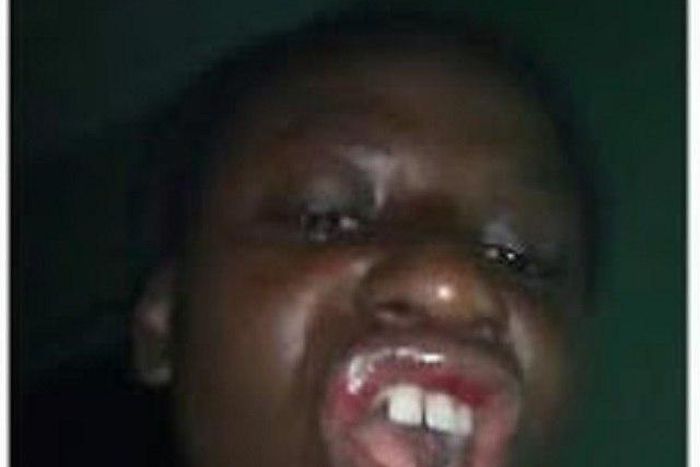 The battered woman with her injured face