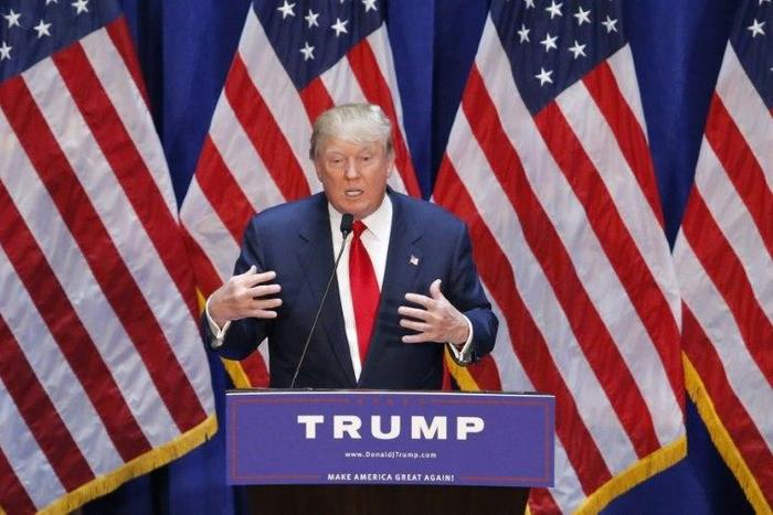 In the glittering lobby of Trump Tower in Manhattan, Donald Trump threw his hat in the ring pledging to "make America great again," a vow that would become his campaign slogan