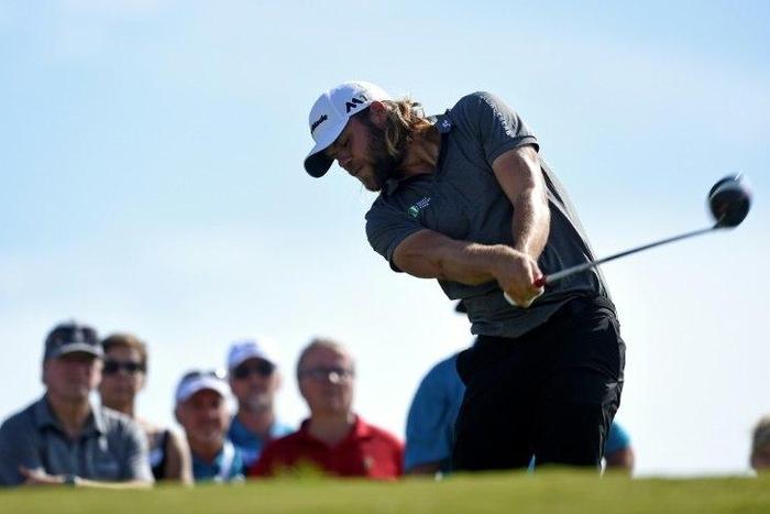 Swedish golfer Johan Carlsson plays a shot from Tee 17 during the first round of Portugal Master golf tounament at Oceanico golf course in Vilamoura on October 20, 2016