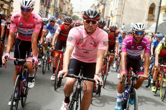 US actor Patrick Dempsey (centre) rides with the peleton at the start of the 7th stage of the 100th Giro d'Italia, from Castrovillari to Alberobello, on May 12, 2017