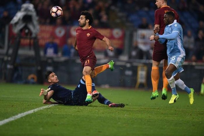 Roma's midfielder Mohamed Salah scores during the Italian Tim Cup second leg semi-final football match AS Roma vs Lazio on April 4, 2017 at the Olympic stadium in Rome