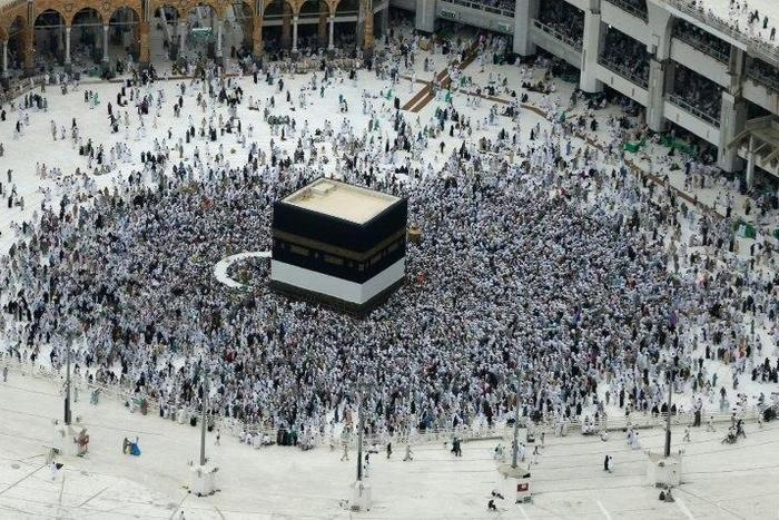 Muslim pilgrims circle the Kaaba at the Grand Mosque in the Saudi city of Mecca