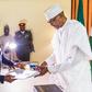 President Muhammadu Buhari receives Presidential Investigation Panel Report from Vice President Yemi Osinbajo in Abuja
