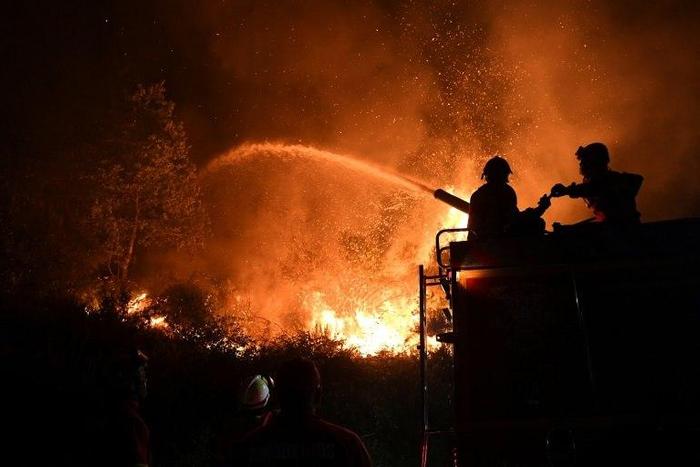 Firefighters near Gois in central Portugal, where even locals who are no strangers to forest fires say they have never seen such a devastating blaze