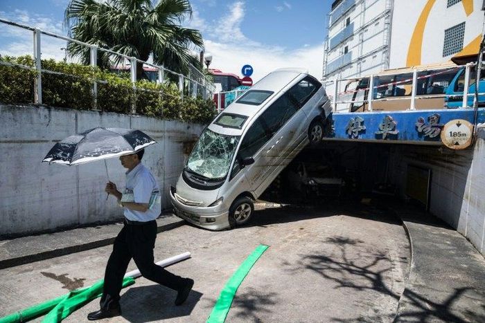 The destruction wrought by the typhoon, which killed at least 10 people, prompted the resignation of Macau's weather chief, an apology from the city's leader and the deployment of the People's Liberation Army Macau garrison to help in relief efforts