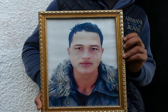 Tunisian Anis Amri (C) is believed to have hijacked a truck and used it to mow down holiday revellers in an attack on a Berlin Christmas market that left 12 people dead