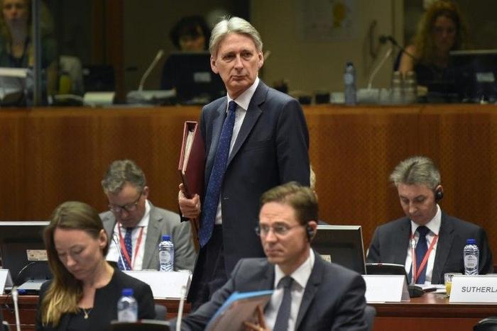 Britain's finance minister Philip Hammond arrives has acknowledged there are divisions in the cabinet over Brexit