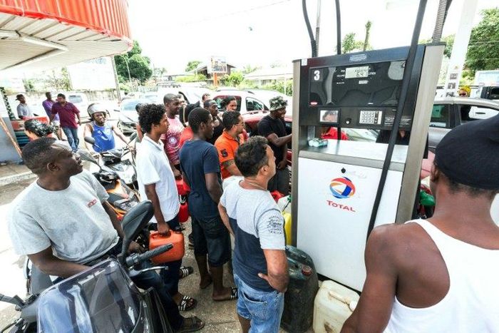 Queues formed at petrol stations in the French overseas territory of Guiana as people tried to stock up on fuel ahead of a general strike on Monday
