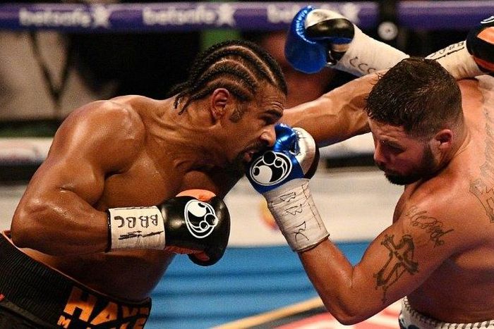 British boxers David Haye (left) and Tony Bellew exchange blows during their heavyweight bout at the O2 arena in London, on March 4, 2017
