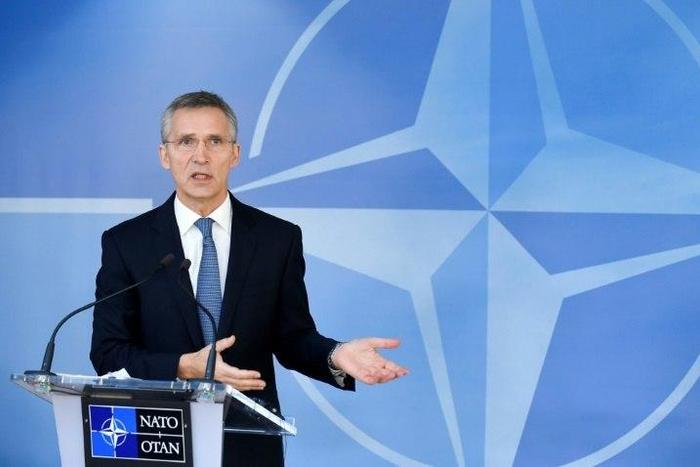 NATO Secretary General Jens Stoltenberg speaks to the press during a Foreign Affairs meeting at the NATO headquarters in Brussels on December 6, 2016