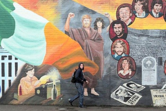 Murals on the Catholic Falls Road in Belfast, scene of relative peace for the past 20 years