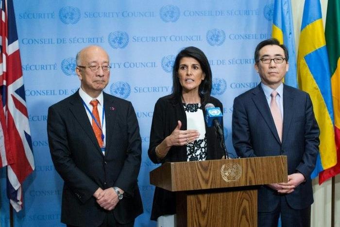US United Nations Ambassador Nikki Haley (C) speaks next to Japanese UN Ambassador Koro Bessho, (L) and the Republic of Korea's UN Ambassador Cho Tae-yul after Security Council consultations on North Korea missile launches on March 8, 2017