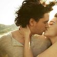 Kit Harrington and Emilia Clarke kiss during a photo shoot in 2012
