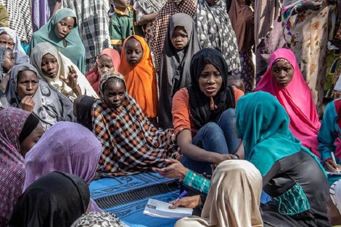 Neemah Arigbabu in the midst of the IDPs
