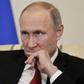 Russian President Vladimir Putin says US intelligence leaker Edward Snowden is "not a traitor"