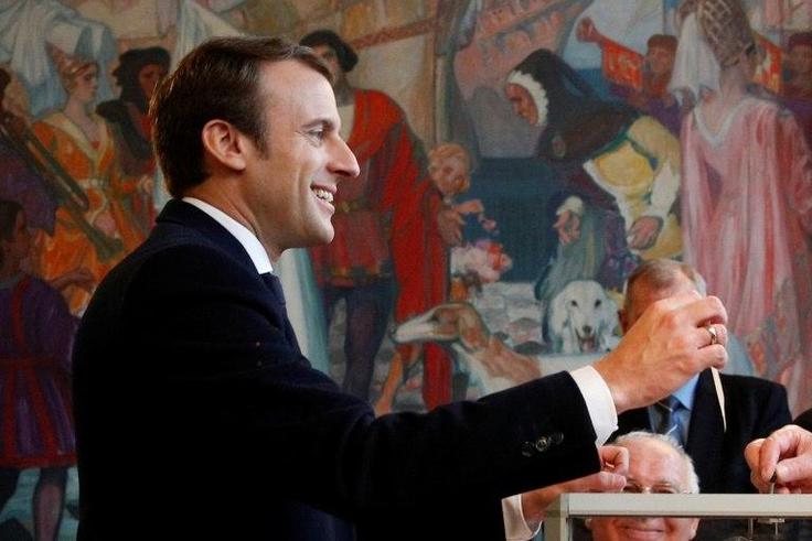 Emmanuel Macron, seen here casting his ballot in Sunday's election, is a centrist who ran a pro-business and pro-EU campaign